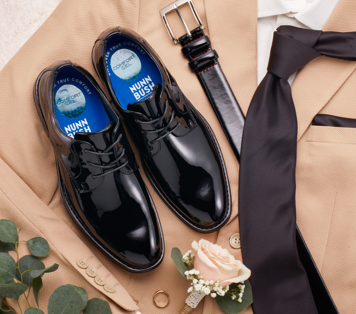 Shop our wedding picks featuring a patent oxford laid out with a suit and accessories