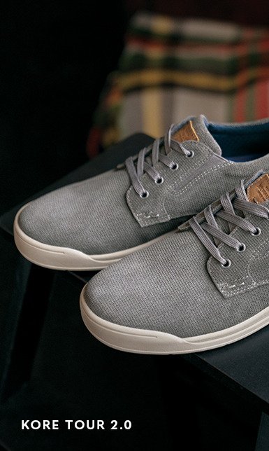 Sneakers Category. Images features the Kore Tour 2.0 in gray. 