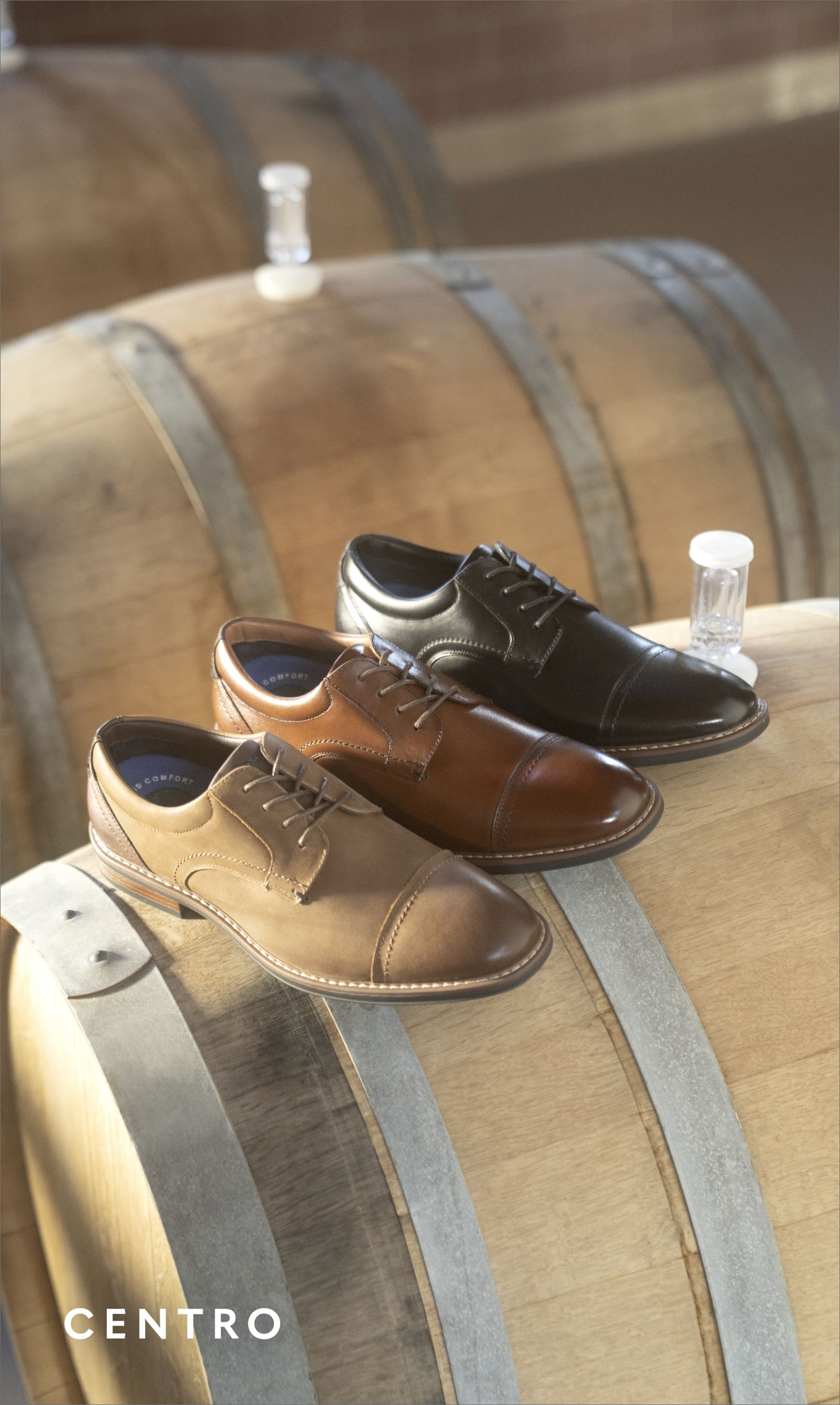 Men's Dress Shoes category. Image features the Centro Cap Toe oxford in cognac.
