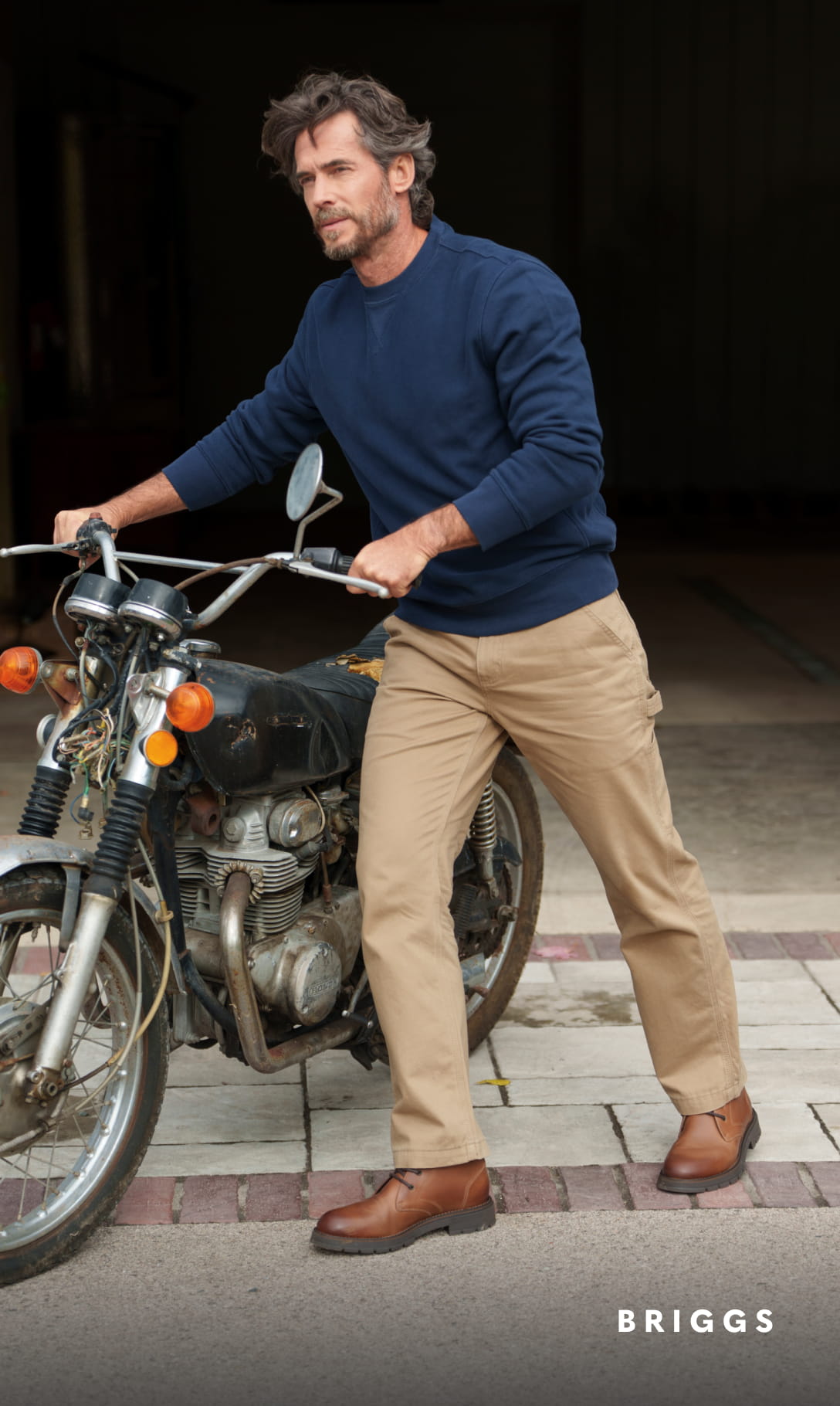 Men's Boots category. Image features the Briggs chukka boot in chocolate brown.