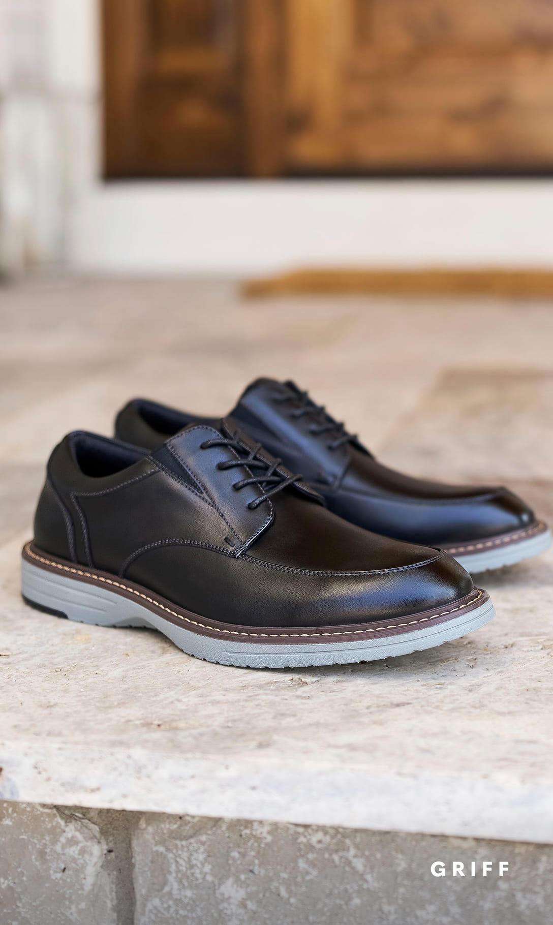 Men's Dress Shoes category. Image features the Griff moc toe oxford in Black.