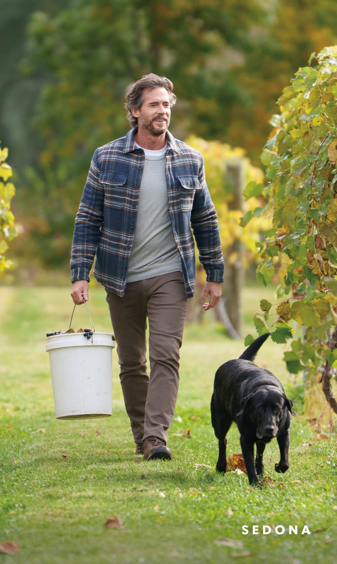 Men's Newest Shoes category. Image features the Sedona boot in an orchard with a dog. 