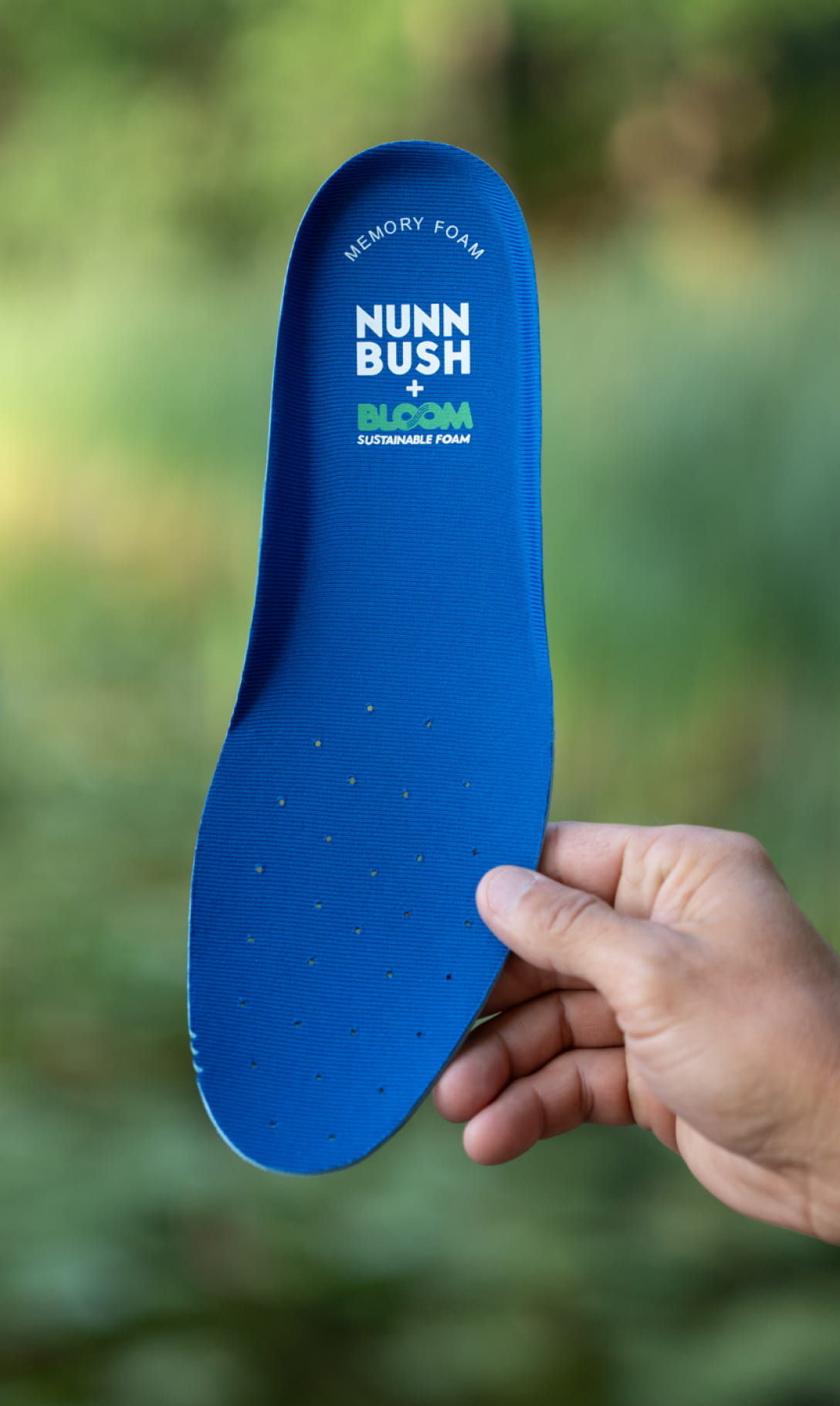  Image features the Bloom footbed with a blurred green background.
