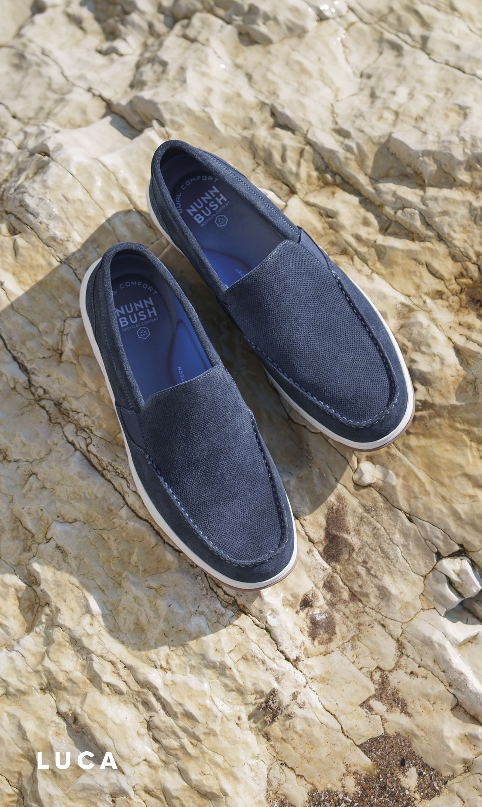 Shoes for Men view all category. Image features the Luca suede loafer in navy.