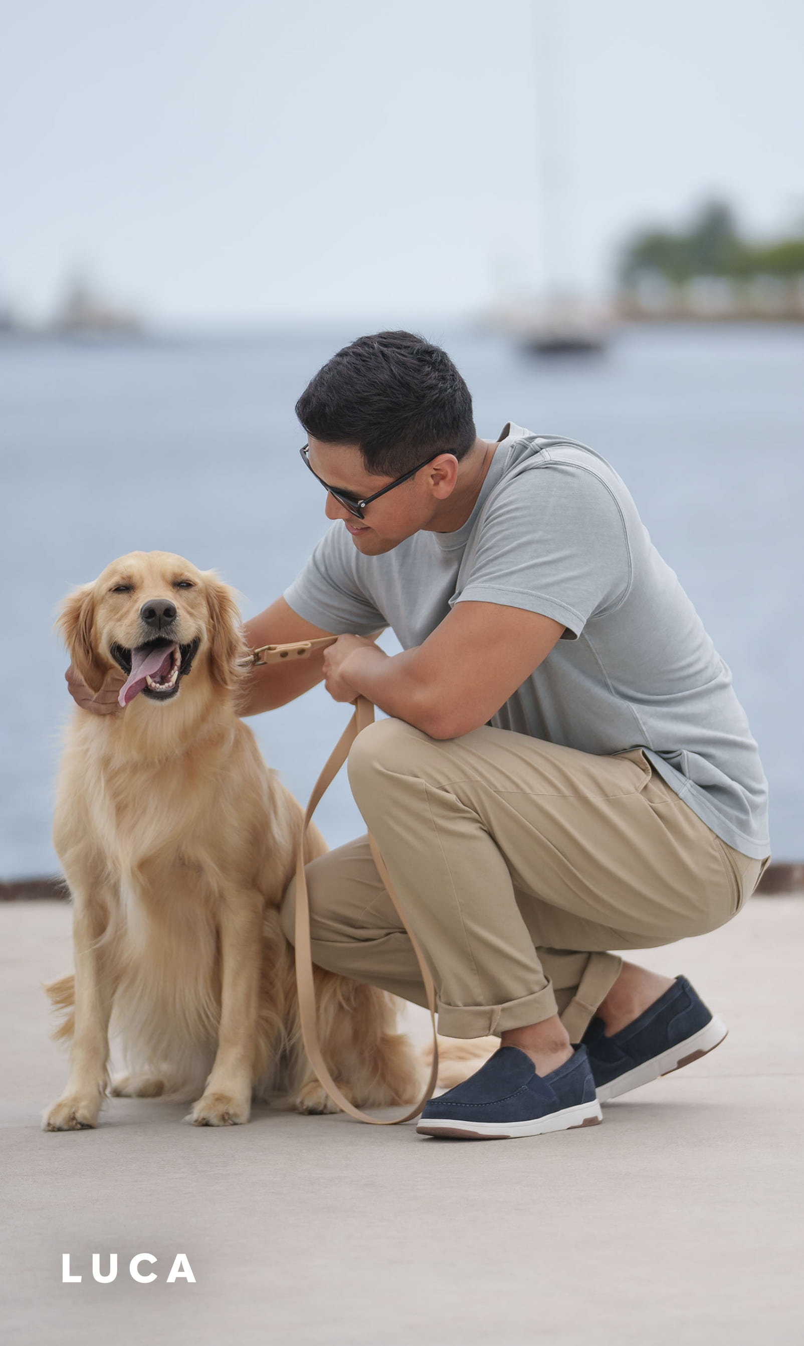 Men's Newest Shoes category. Image features the Luca suede loafer in navy with a golden retriever. 